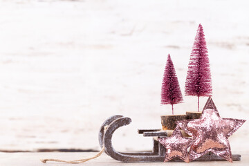 Christmas tree composition on wooden background.