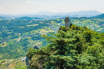 Fototapeta na wymiar San Marino, Montale, the third tower of three peaks which overlooks the city. The tower is located on the highest of Monte Titano's summits.