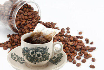 Kopi is a type of traditional coffee local to Singapore and Malaysia. It is a highly caffeinated black coffee served with milk and sugar.