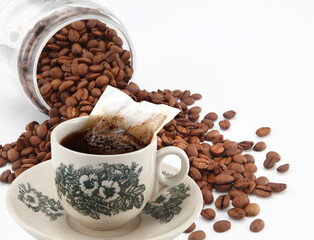 Kopi is a type of traditional coffee local to Singapore and Malaysia. It is a highly caffeinated black coffee served with milk and sugar.