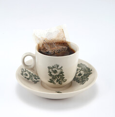 Kopi is a type of traditional coffee local to Singapore and Malaysia. It is a highly caffeinated black coffee served with milk and sugar.