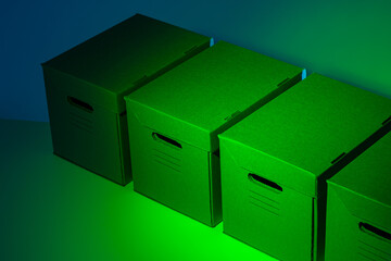 Eco-friendly packaging. Cardboard boxes with lids and handles. Boxes made of biodegradable materials. Boxes for transporting things.