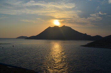Fototapeta premium sunset over the mountains in Greece