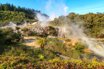 Orakei Korako Geothermal Park, New Zealand.  Steam rising from hot pools in the park's colorful terraces