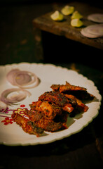 Spicy fish fry ready to eat on a plate for lunch