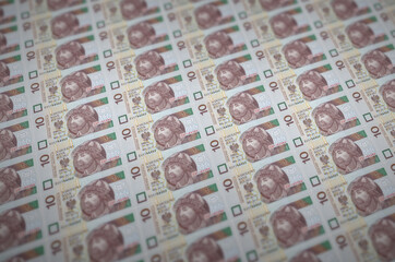 10 Polish zloty bills printed in illegal money production conveyor. Collage of many fake bills....