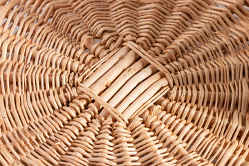 Handmade woven wicker work basket tray close up isolated on white