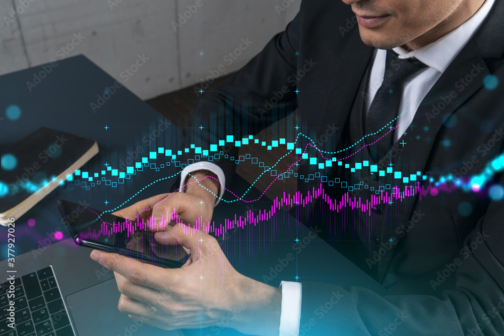Poster trader in office working with smartphone, forex graph hologram to analyze market behavior, typing ph