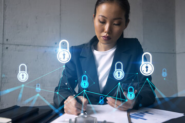 Businesswoman taking notes and lock drawing hologram. Double exposure. Education technology security solution concept.
