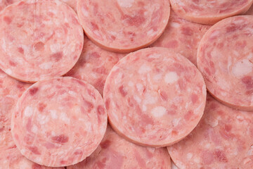 Boiled sausage isolated on white background. Slices.
