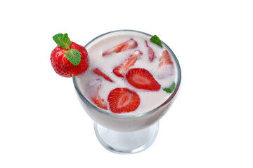 Fresh strawberry in a white plate on table, top view.