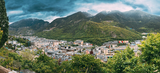 Fototapeta na wymiar Andorra, Principality Of The Valleys Of Andorra. Top Panoramic View Of Cityscape In Summer Season. City In Pyrenees Mountains