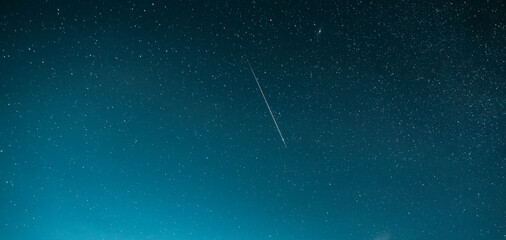 Night Starry Sky With Glowing Stars And Meteoric Track Trail. Meteorite Trail In Starry Sky...