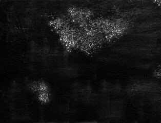 Abstract black background with white spots on old shabby black surface