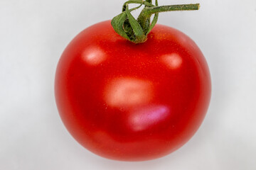 Close up of a ripe and beautiful red tomato