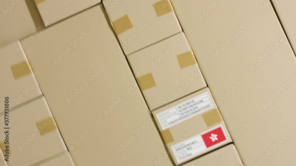 Poster carton with printed made in hong kong text and flag. warehouse logistics concept