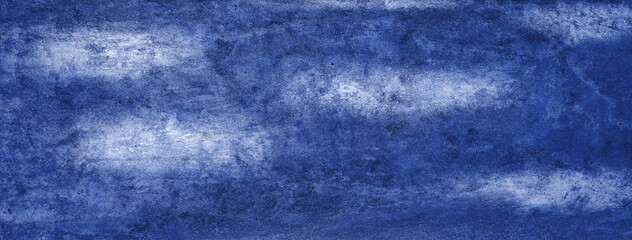 Beautiful textured blue grunge wall background for background

