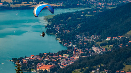 A paraglider above the famous Tegernsee, Bavaria, Germany
