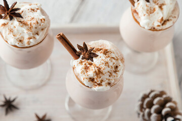 Three eggnog cocktails