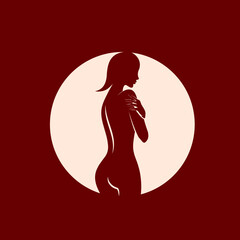 Sexy, beautiful woman silhouette in a circular emblem.Nude female body in negative space.Circle logo isolated on dark red background.Vector illustration.