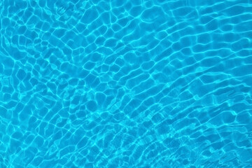 Pure water with ripples in swimming pool