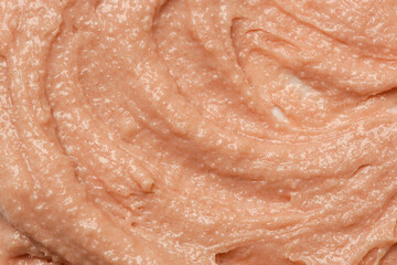 Brown natural cosmetic face mud, textured background. Red clay face mask, close up