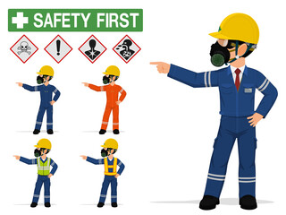 An industrial worker with respirator is pointing to something.