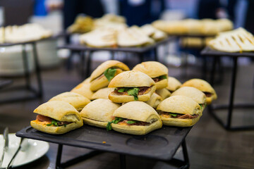 mini burgers on a tray. Catering party