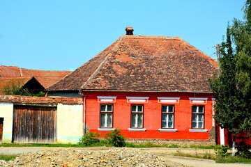 Typical rural landscape and peasant houses in  the village Cincsor, Kleinschenk, Transylvania,...