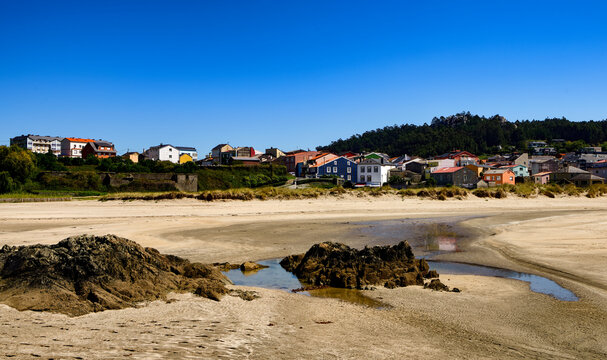 View of the picturesque village of Espasante by the beach, in the Galicia region of Spain.