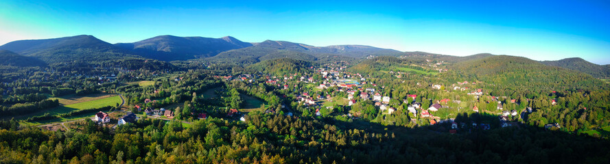 Fototapeta na wymiar Aerial view of Karpacz city and the Karkonosze Mountains at summer, Poland
