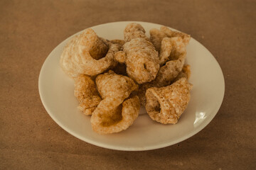 Pork rinds on a plate.