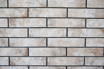Beige and gray brick wall background
