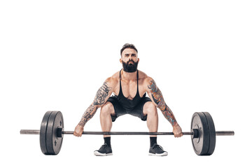 Fototapeta na wymiar The technique of doing an exercise of deadlift with a barbell of a muscular strong tattooed bearded sports men on a white studio background. Isolate.