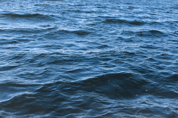 Dark blue Water and some waves on the sea, deep Blue sea.