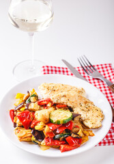 Grilled vegetables and fried chicken breast