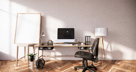 Computer and office tools on desk in room interior loft style with white brick wall on wooden floor.3D rendering