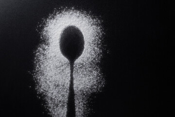 flour spoon outline on the black background