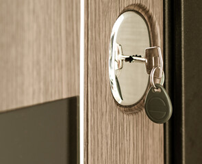 door with key in keyhole