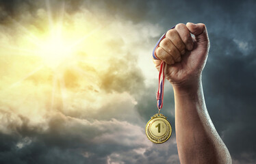 Medal for the first place on sky background. Victory concept