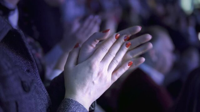 Business woman cheering clapping hands at coference meeting