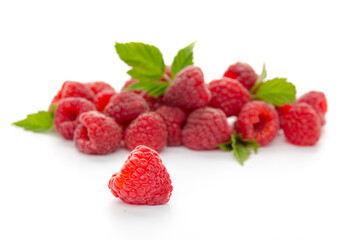  raspberries with leaf isolated on a white background