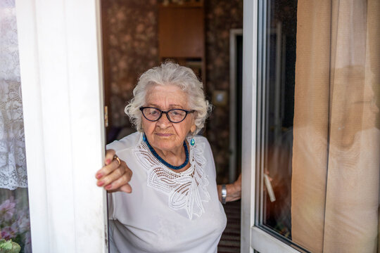 Portrait of an elderly woman at her home
