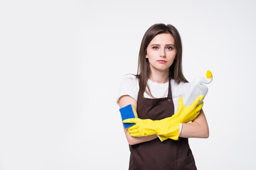 Young housewife cleaning detergent on white background