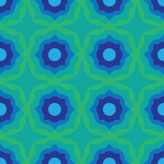 Abstract geometric seamless vector pattern in blue and green. Surface print design for fabrics, stationery, scrapbook paper, gift wrap, and packaging.