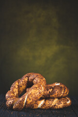 Bagel with sesame on black background