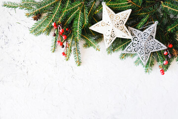 Twigs of Christmas tree and Christmas decoration on white background. Christmas background.