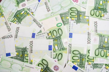 Background of 100 Euro banknotes.Much money. Financial background. Business concept.
