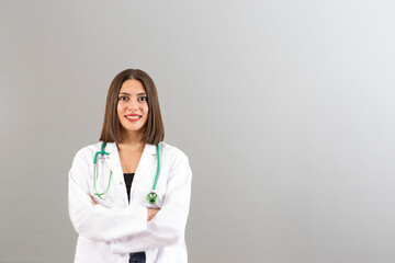 Beautiful smiling Turkish woman doctor portrait in studio she is confident mood
