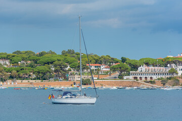 View of Sant Pol beach in the village of Sant Feliu de Guixols at Costa Brava in Catalonia, Spain